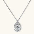 Sterling silver necklace featuring a large pear-shaped moissanite stone in an ornate setting with smaller accent stones