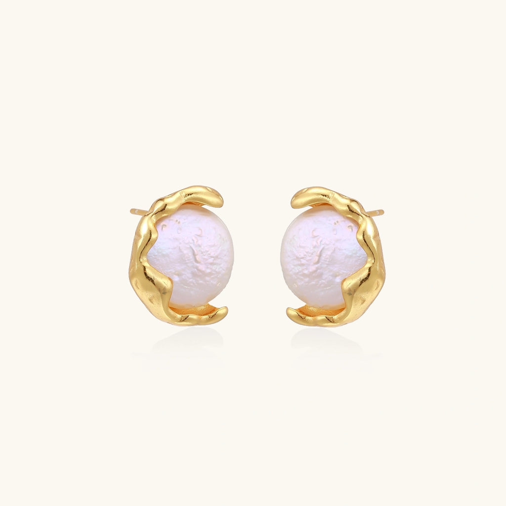 Gold vermeil studs with lustrous pink freshwater pearls in organic crescent settings