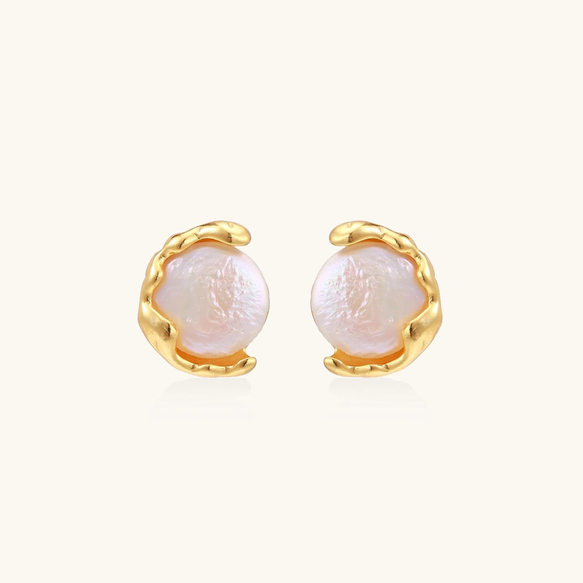 Gold vermeil studs with lustrous pink freshwater pearls in organic crescent settings