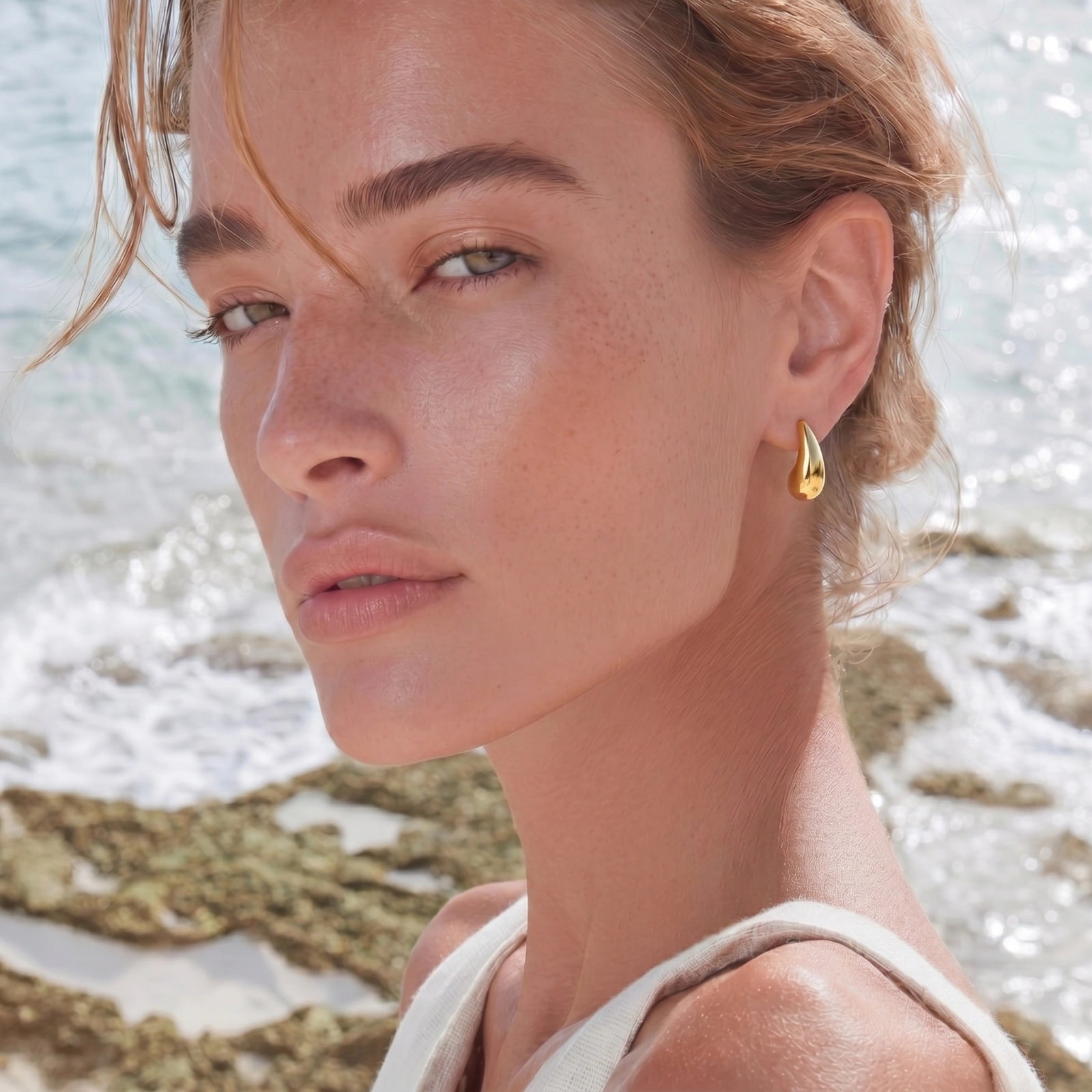 Golden Teardrop Studs